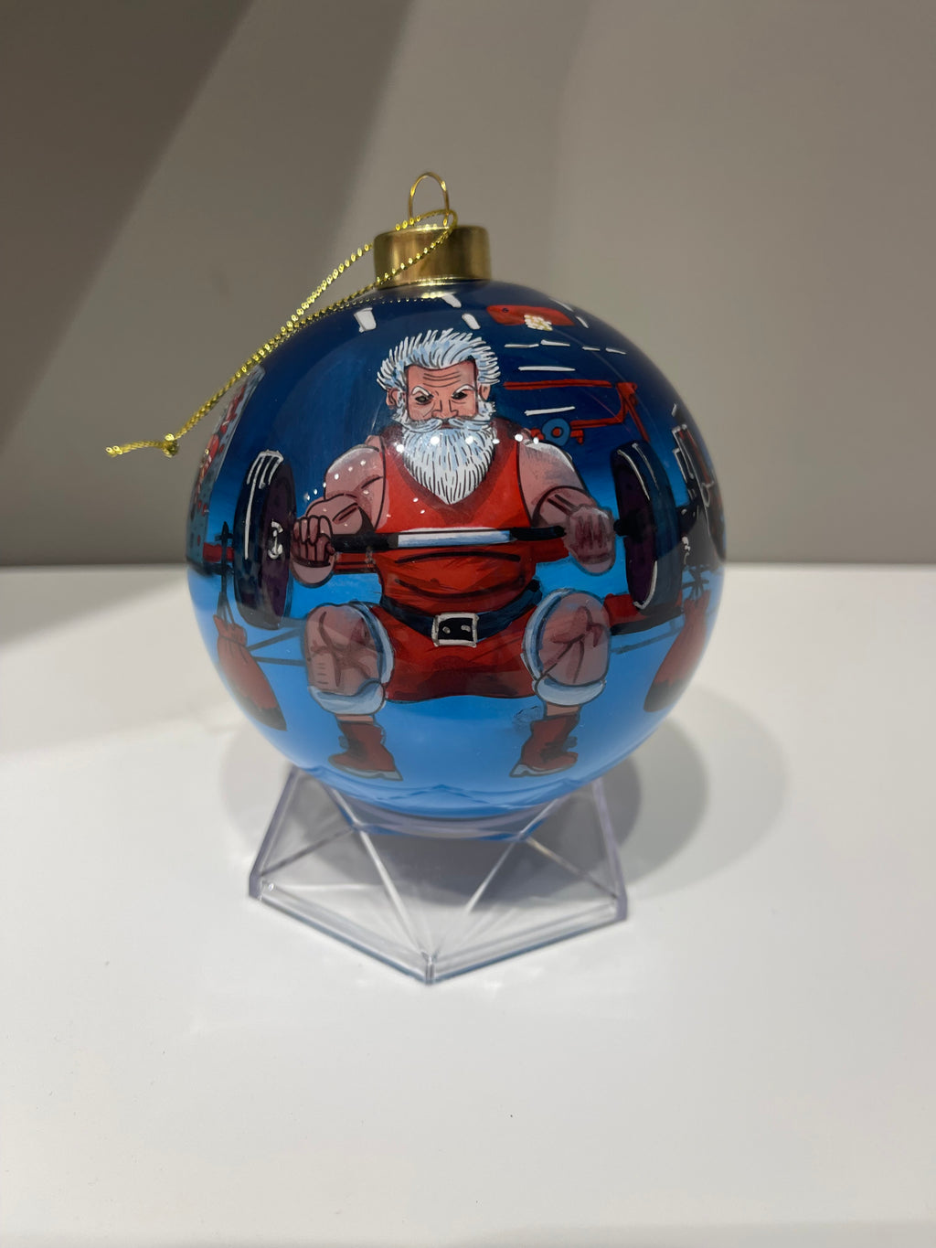 Santa Claus Working Out Limited Edition Glass Ornament - 4 inch